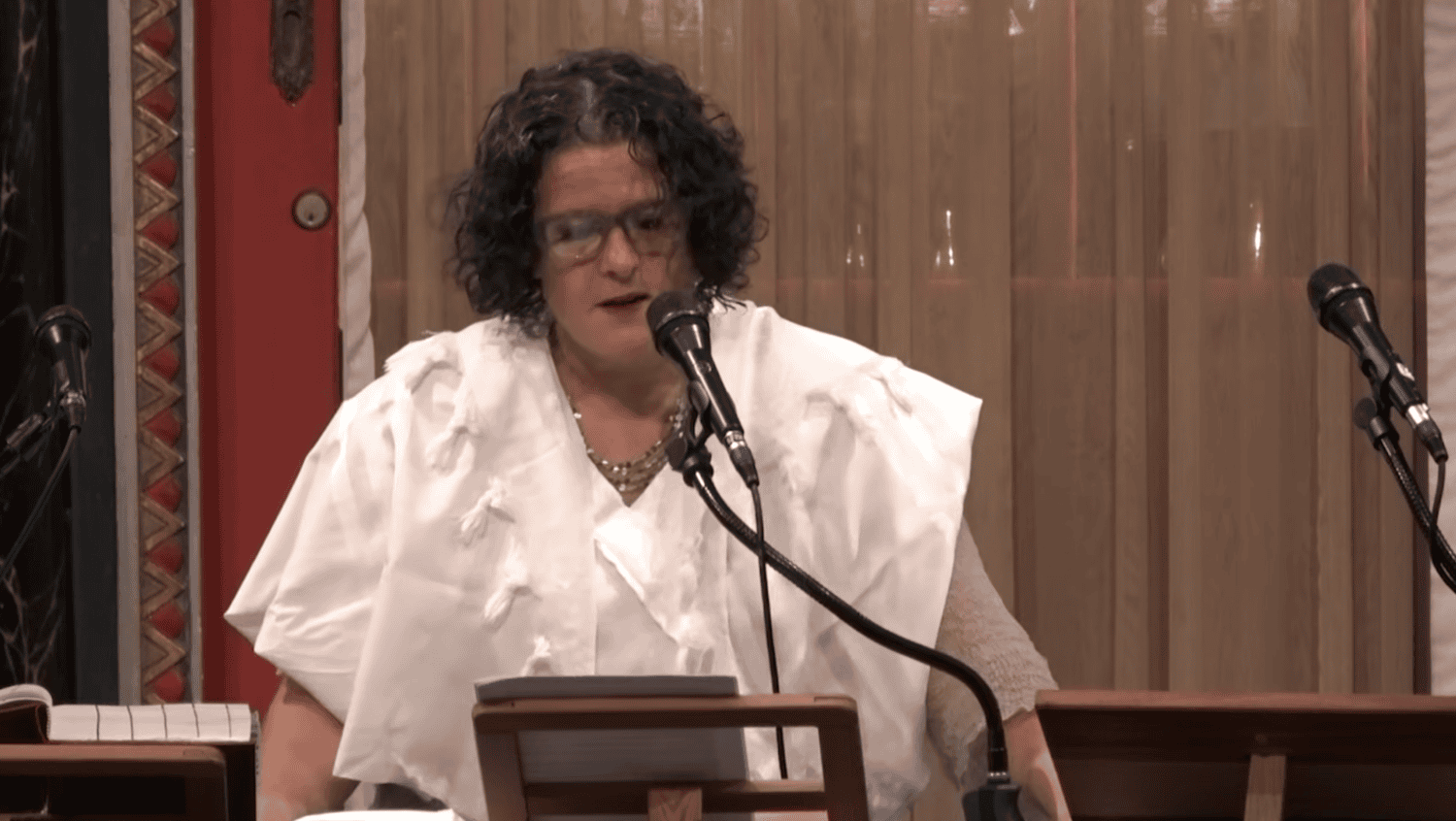 Rabbi Felicia Sol speaks from the bimah in the BJ Sanctuary