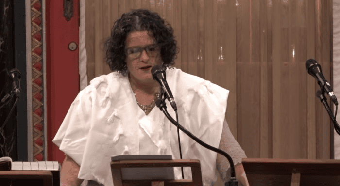 Rabbi Felicia Sol speaks from the bimah in the BJ Sanctuary