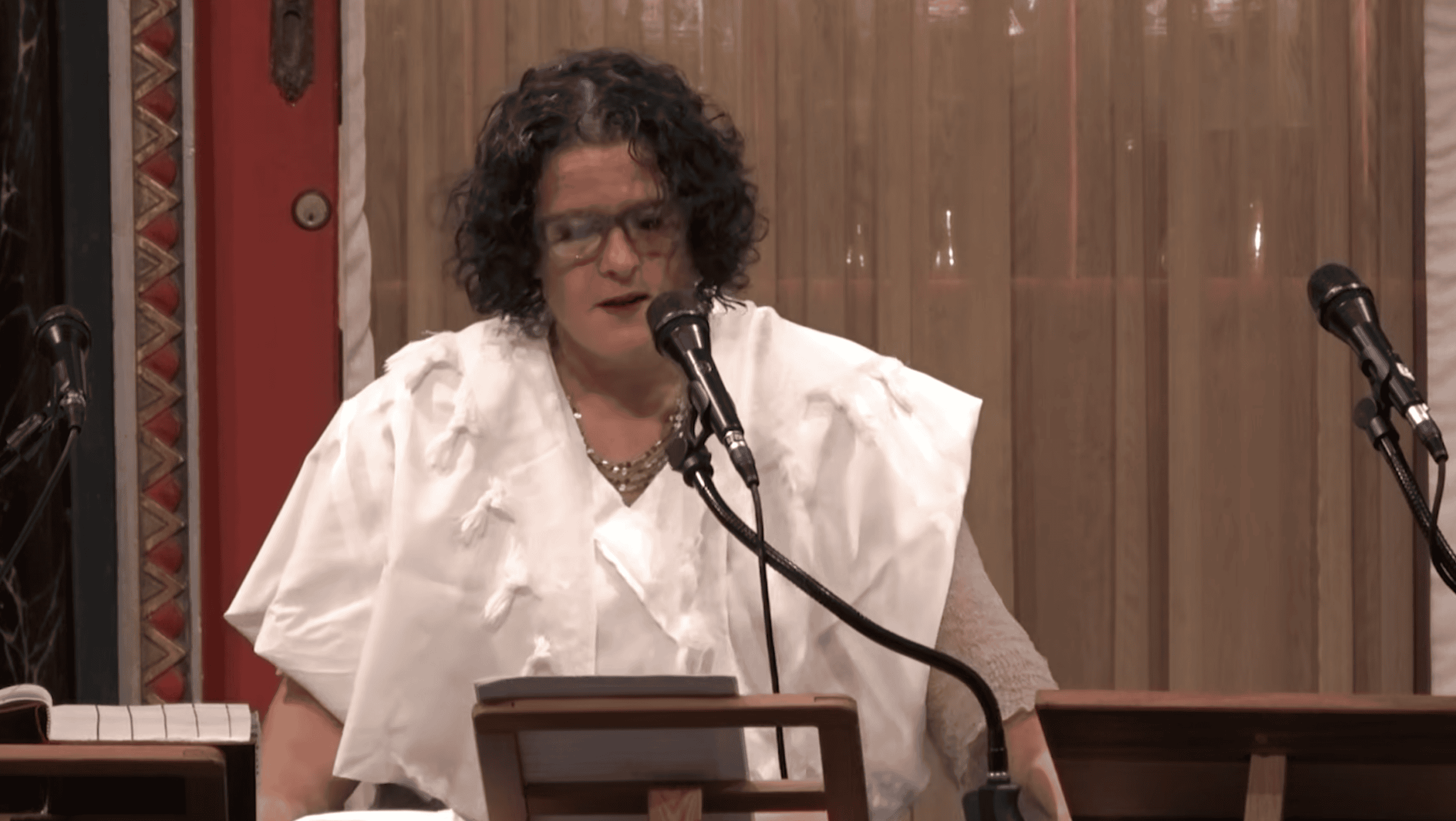 Rabbi Felicia Sol speaks from the bimah in the BJ Sanctuary